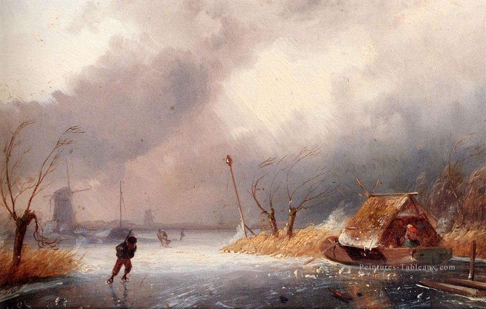 Une neige Paysage avec des patineurs sur une voie navigable gelée Charles Leickert Peintures à l'huile
